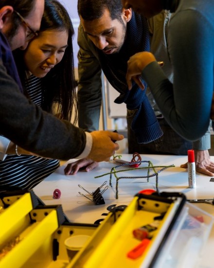 Students of the international MBA of emlyon business school, discussing some strategic matters during a competition.